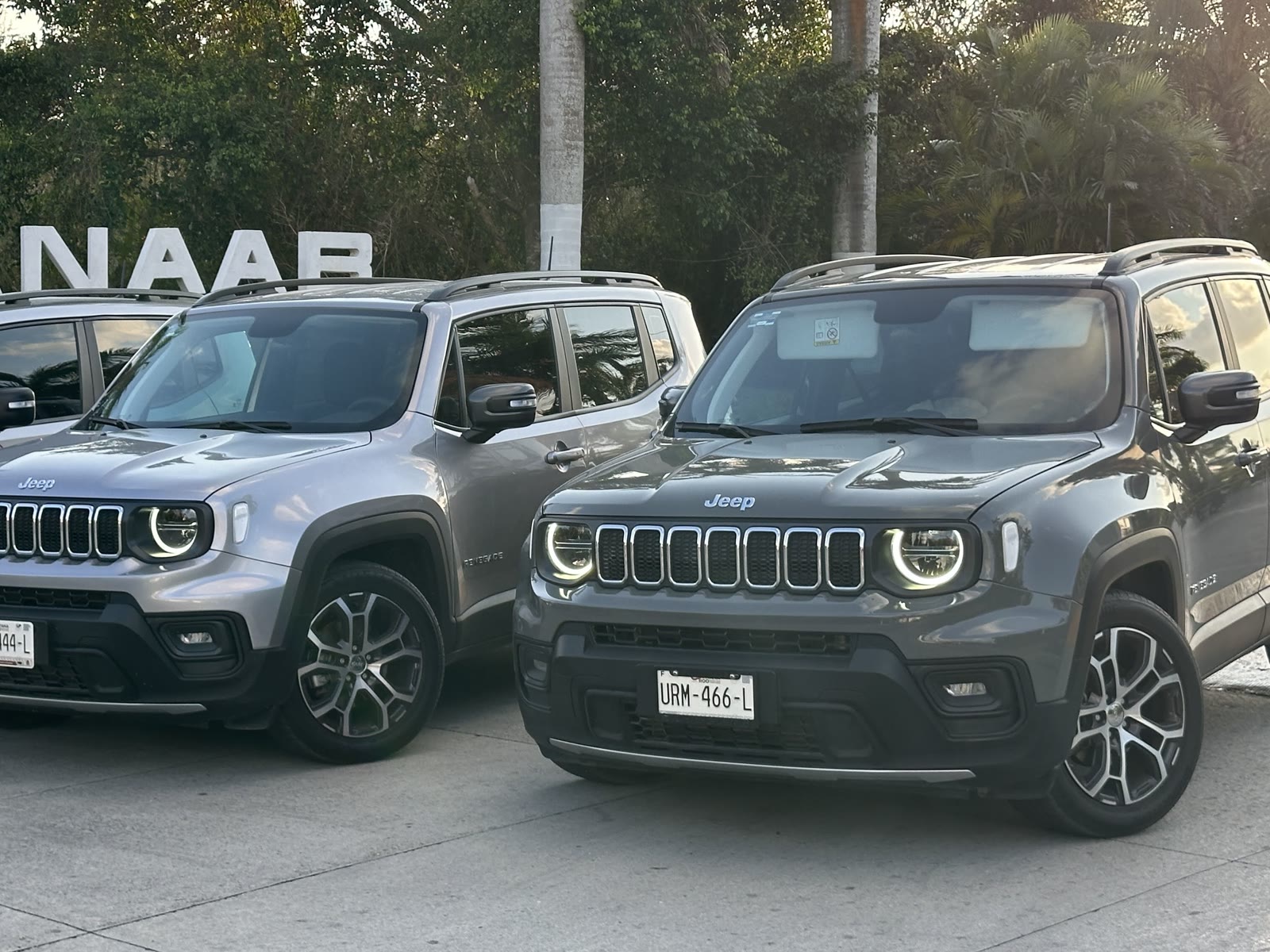 Three Jeep Renegades lined up on the island