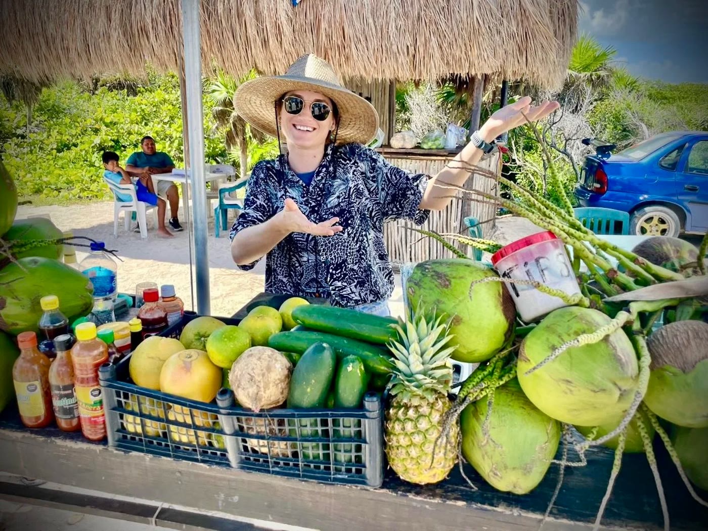A roadside fruit and coconut stand on the island