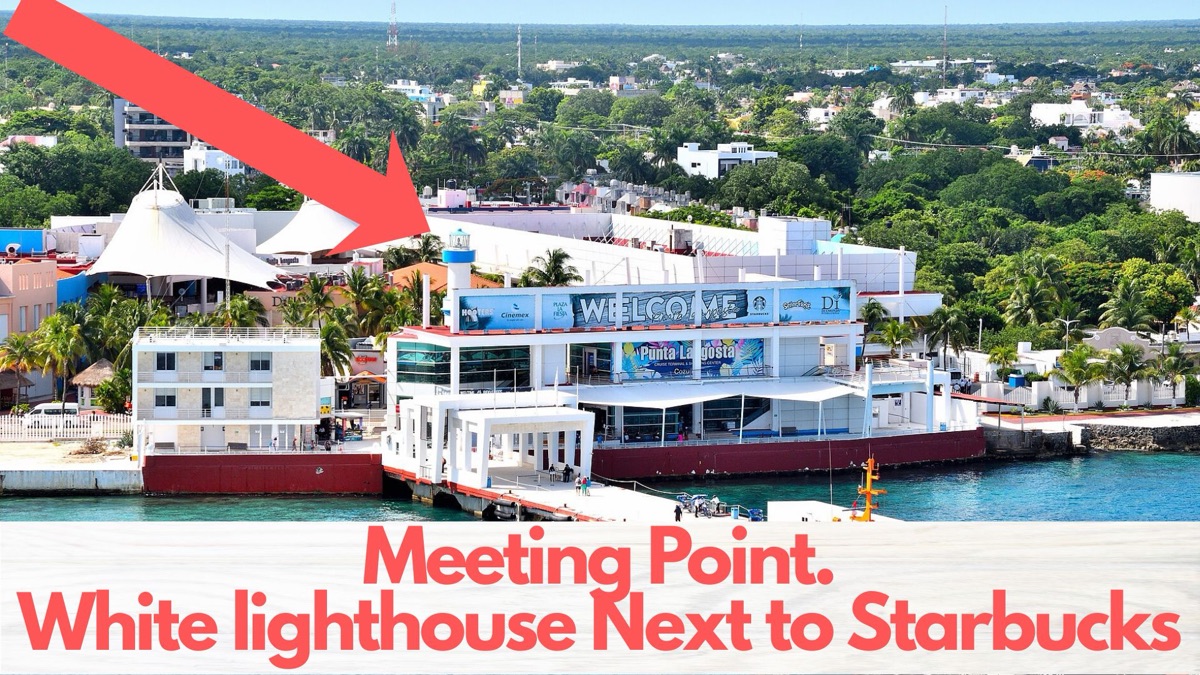 Punta Langosta terminal seen from the ship, with the white lighthouse marked